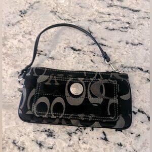 Black and gray coach wristlet